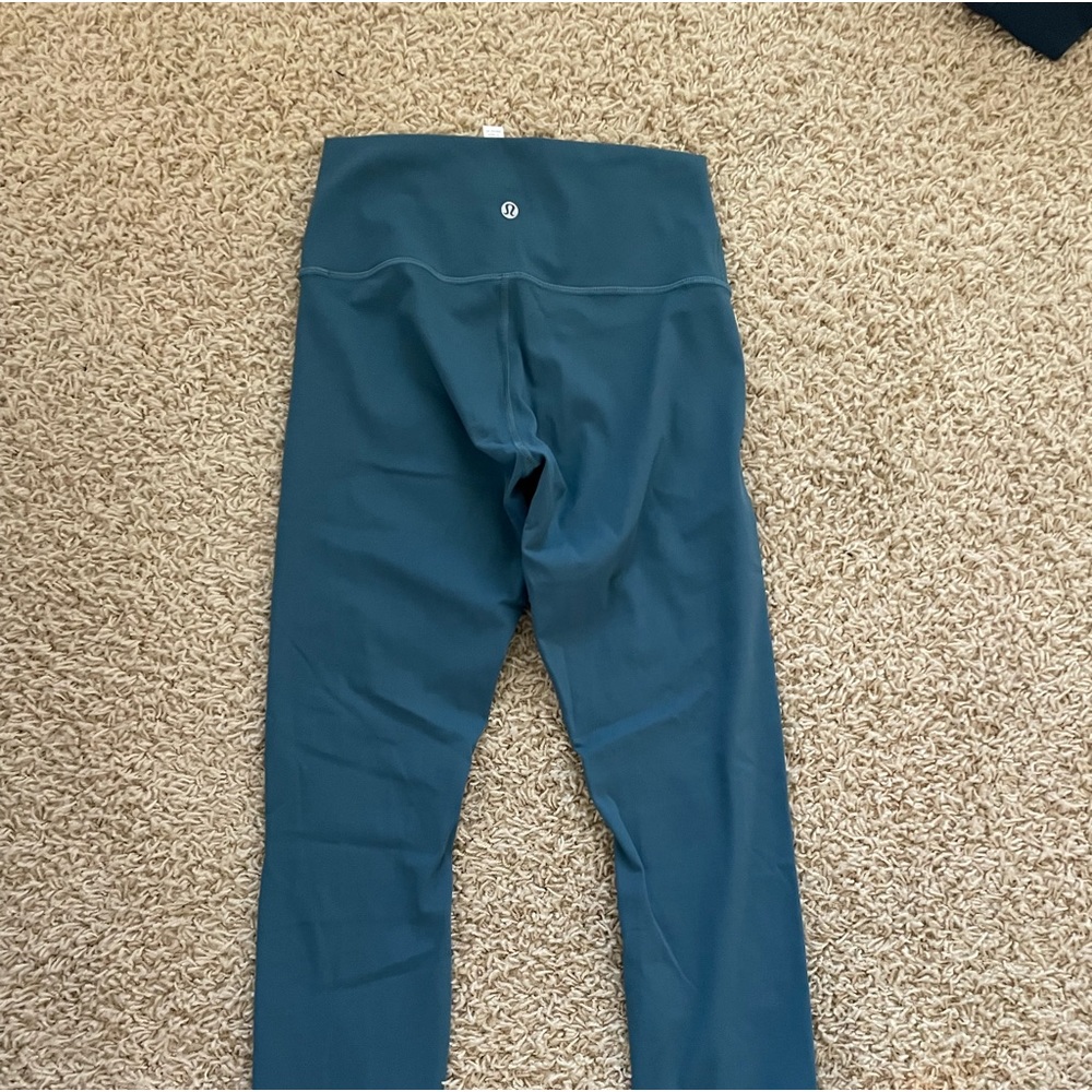 Size 6 worn once lululemon leggings in blue wunder under